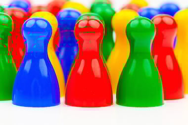 green, red, blue and yellow Ludo pieces
