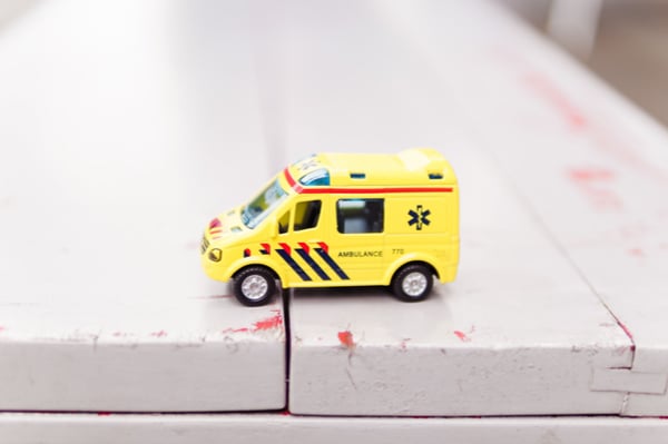 yellow toy ambulance