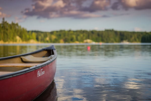 a wooden boat on the lake