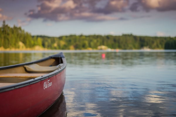 a wooden boat on the lake