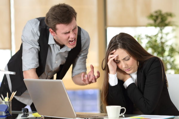 man is yelling at an employee