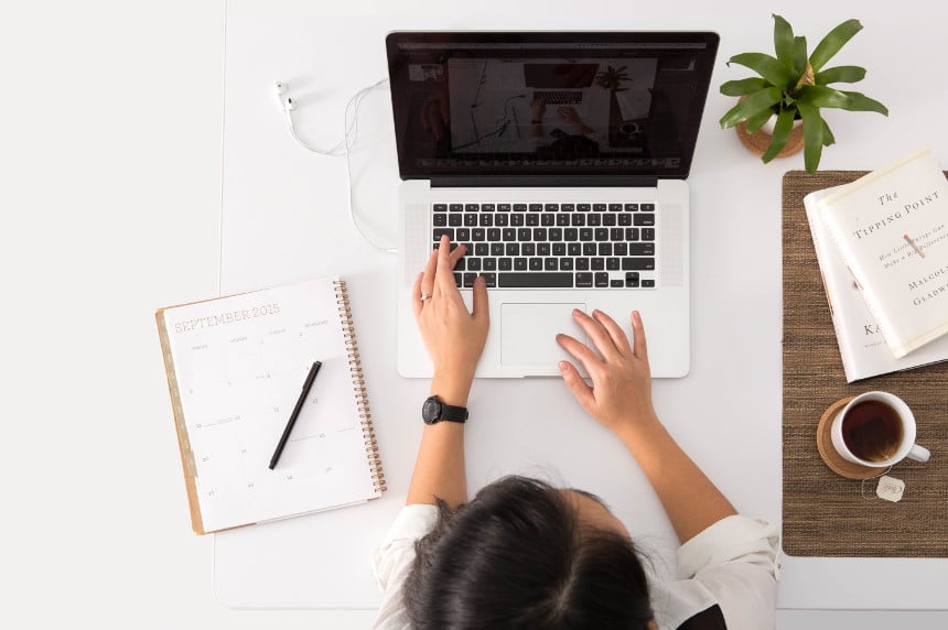 Women typing on laptop