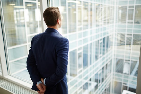 man at work is looking through the window