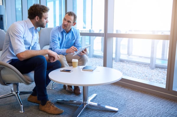 Two men talking