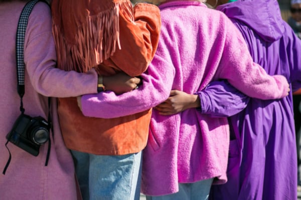 Women hugging each other