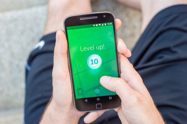Smartphone screen with "Level Up" text on it