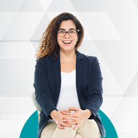 female smiling on chair