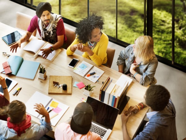 Inclusive workplace and diverse team having meeting