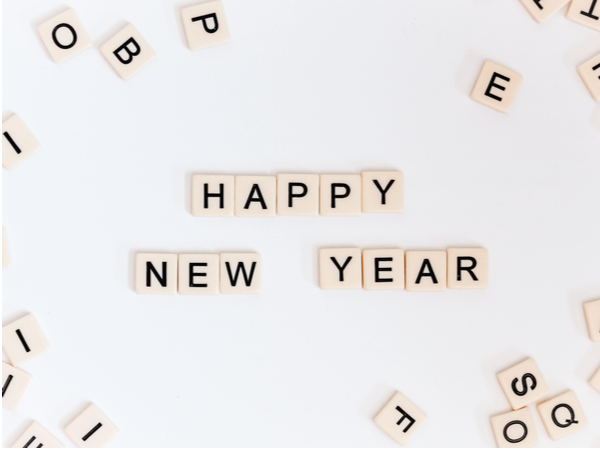 Scrabble tiles spelling out 'Happy New Year'