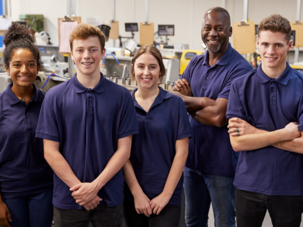Group of apprentices smiling at the camera