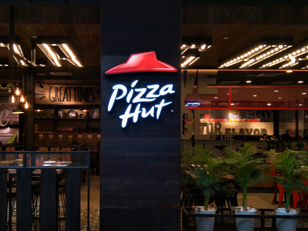 Pizza Hut logo on a restaurant front
