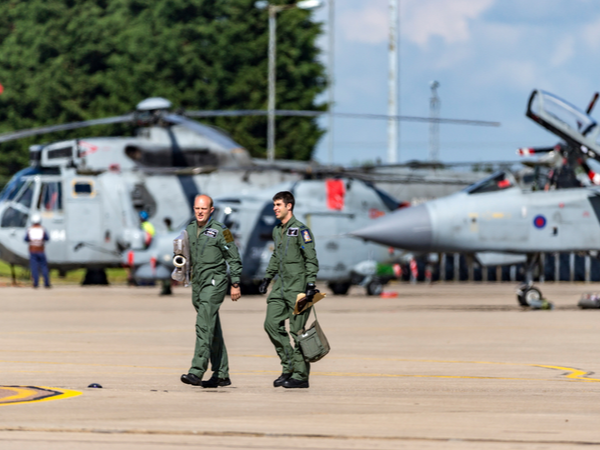 Two RAF pilots walking and talking