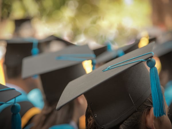 A group of students with mortar boards at graduation