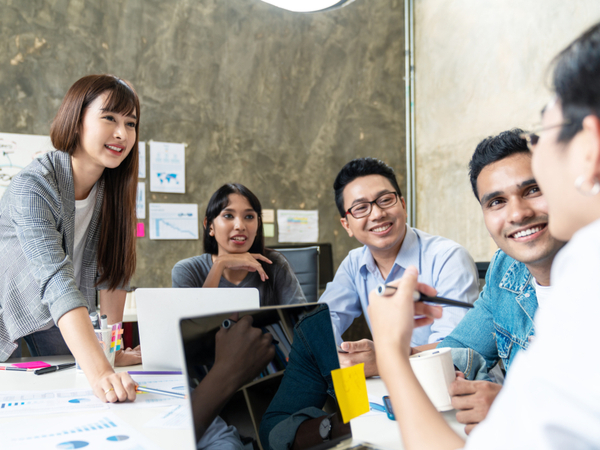 An image of an engaged team working together