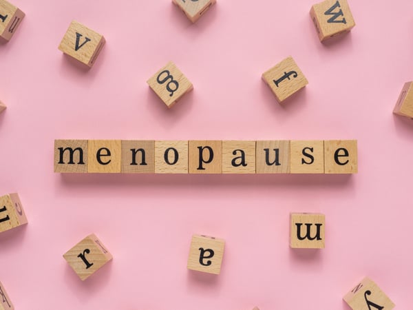 An image of the word menopause spelled out in wooden blocks