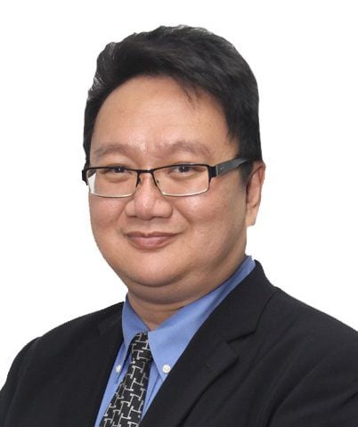 Dr. Gerald  Goh Guan Gan FCMI