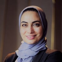 A photo of Maie Ahmed, current Senior Managing Director at Teneo