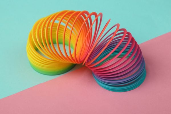 A slinky on a colourful background