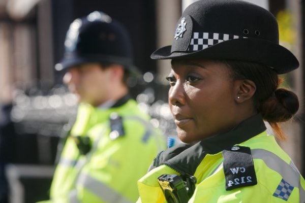 LONDON, UK - Apr 19, 2017: Metropolitan policewoman on duty at 10 St James's Square