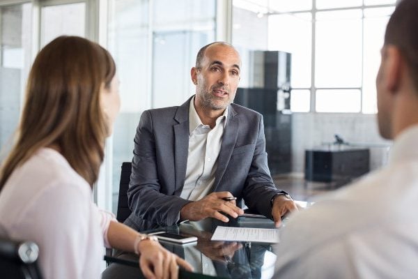 A consulting advising two businesspeople