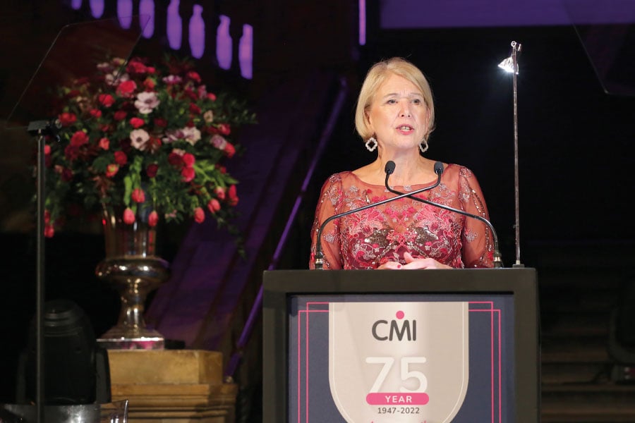 Ann Francke OBE giving a speech on the stage