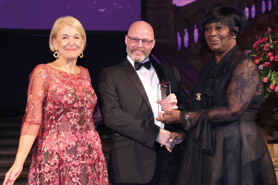 Heather Melville OBE and Ann Francke OBE presenting the Outstanding Apprentice of the Year Award to Johnathan Dodd