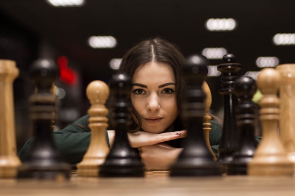 woman with chessboard