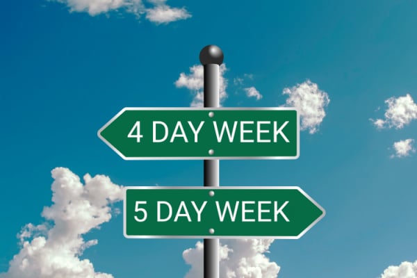 Sign depicting arrow to 4 day week one way and arrow to 5 day week the other way