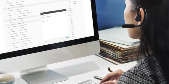 Stock photo of woman writing an email