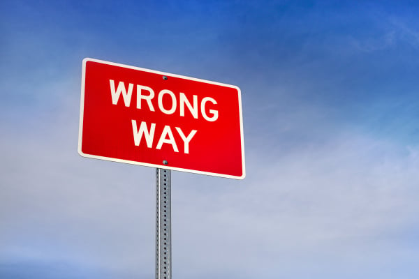 Red sign with the text 'Wrong Way'