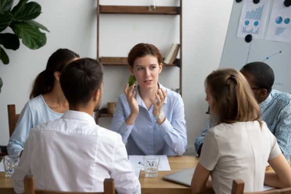 A group of people partaking in a coaching session