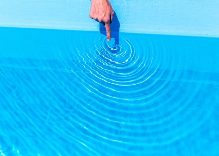 An image of a hand in water