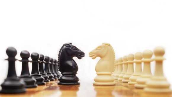 Two sides of the chessboard facing each other