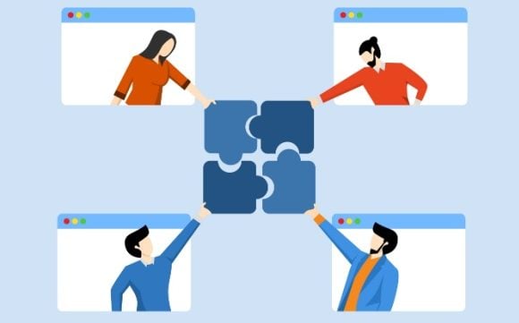 Remote employees slotting pieces of a jigsaw puzzle together