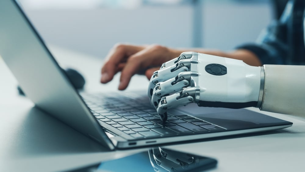 Robotic hand typing on a keyboard