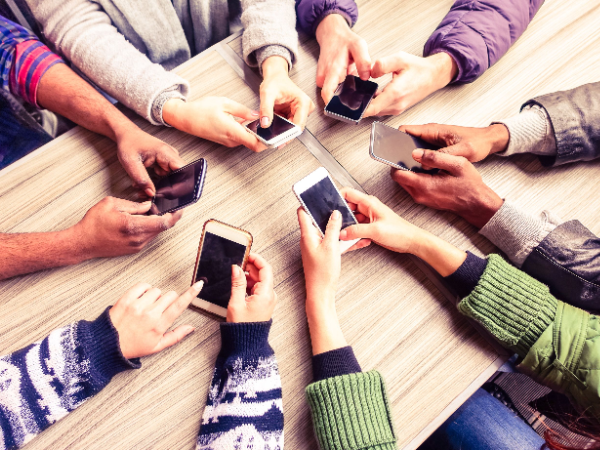 Group of people on their phones