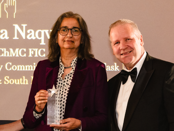 Zarina Naqvi receiving her award