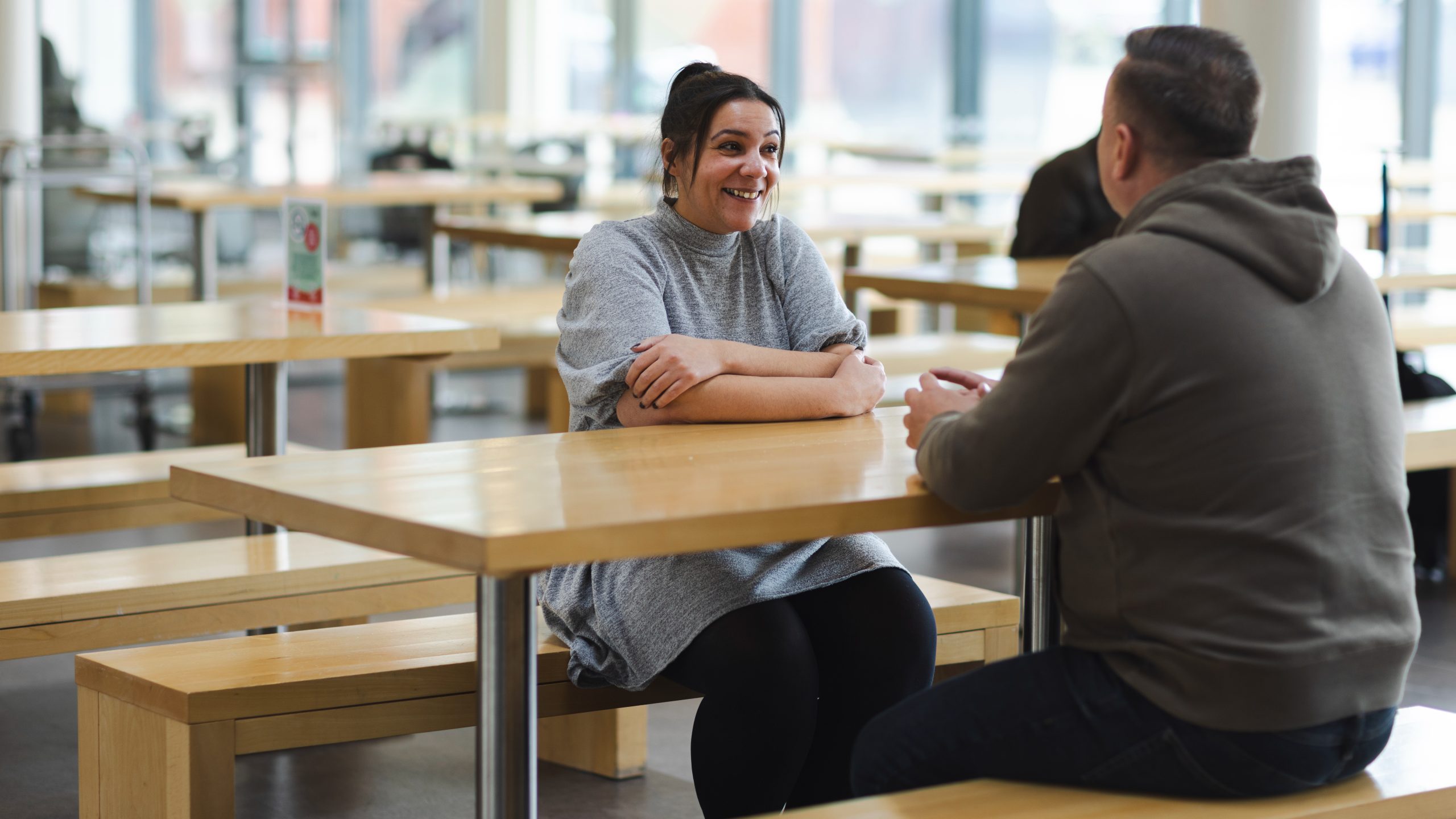 Two people in conversation