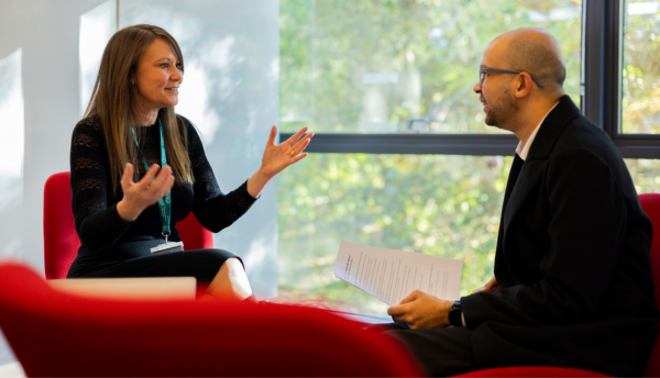 Two colleagues in conversation