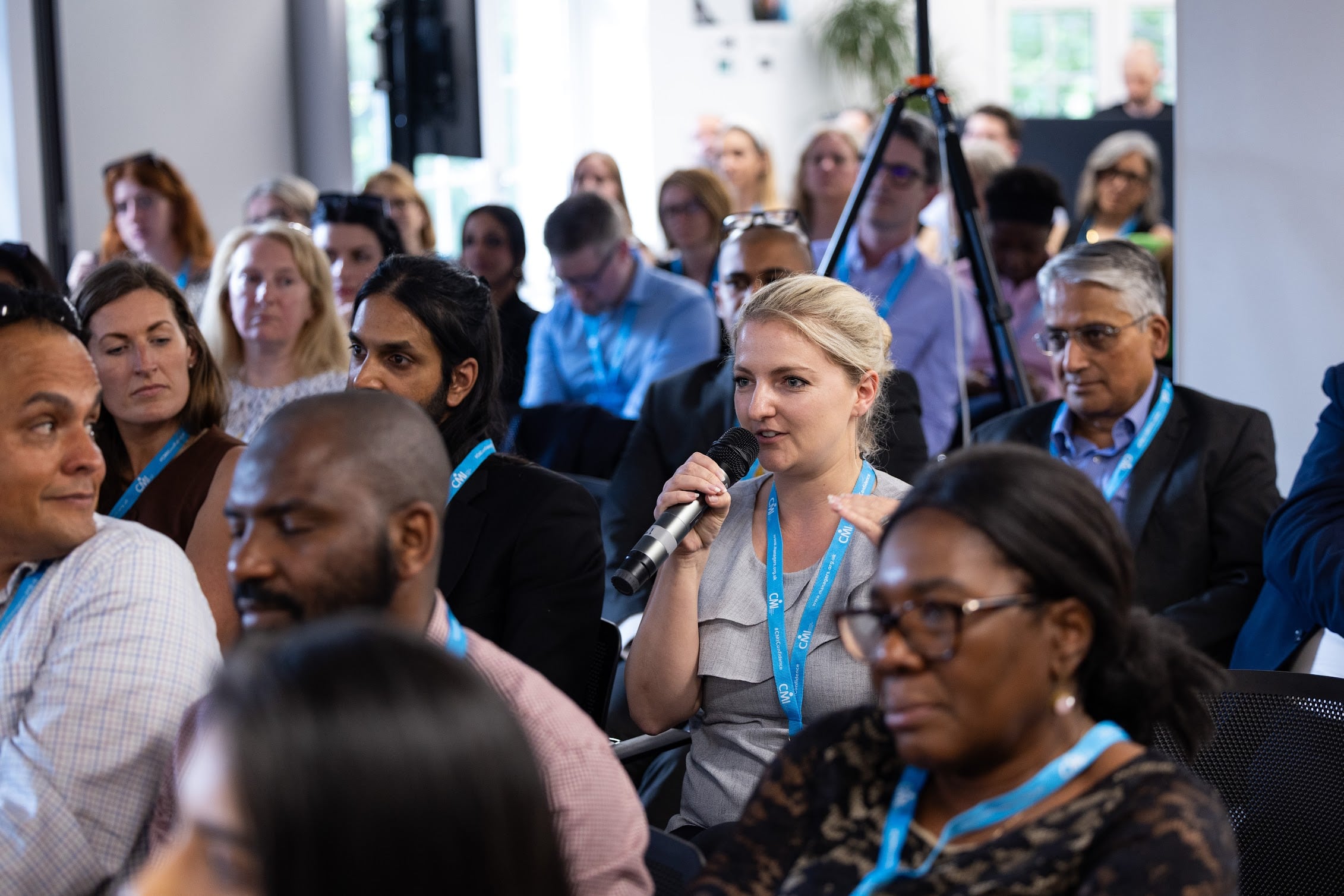 People speaking at an event