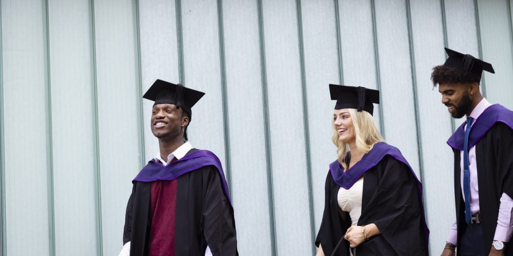 Some graduates walking together