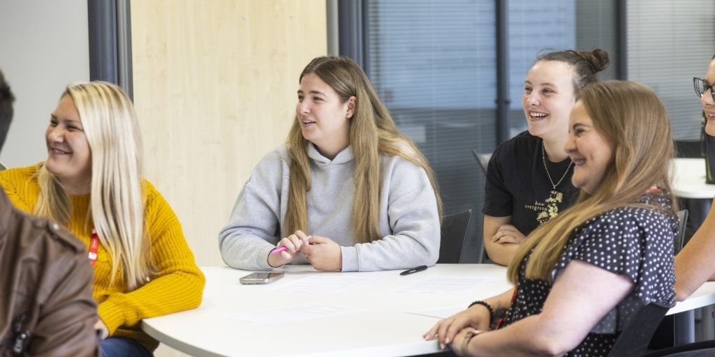 A group of people in conversation