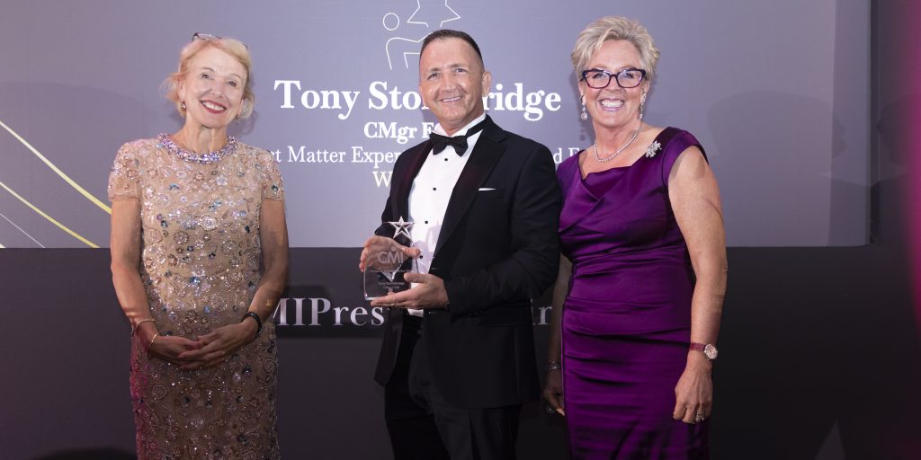 Tony Stonebridge CMgr FCMI being presented with his award
