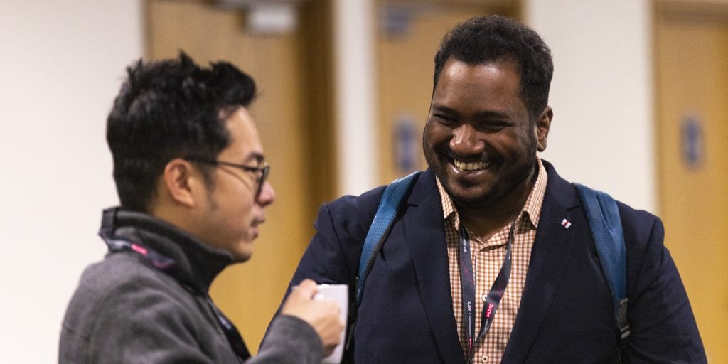 Two people in discussion