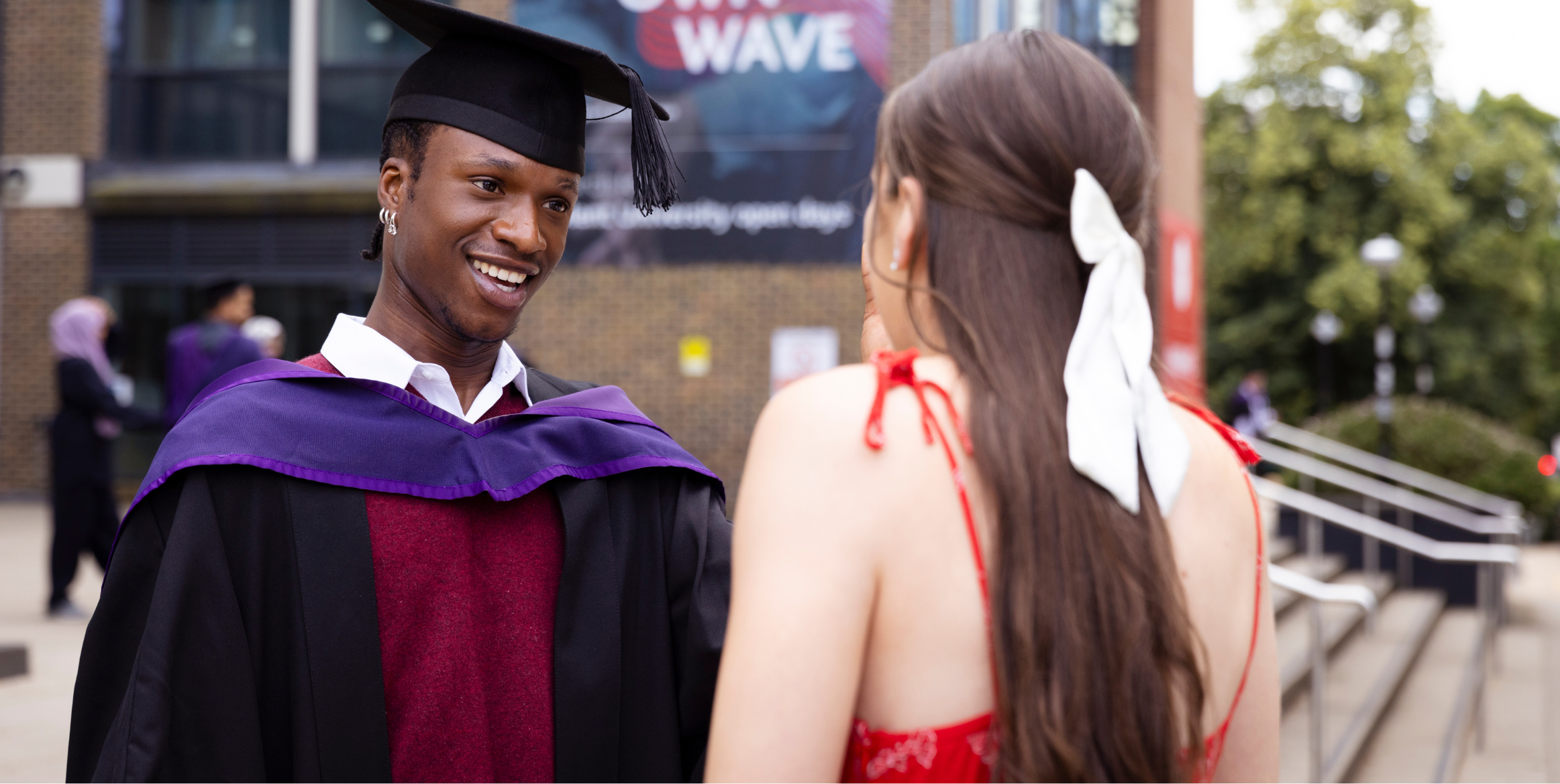 CMI learners in conversation at their Graduation ceremony