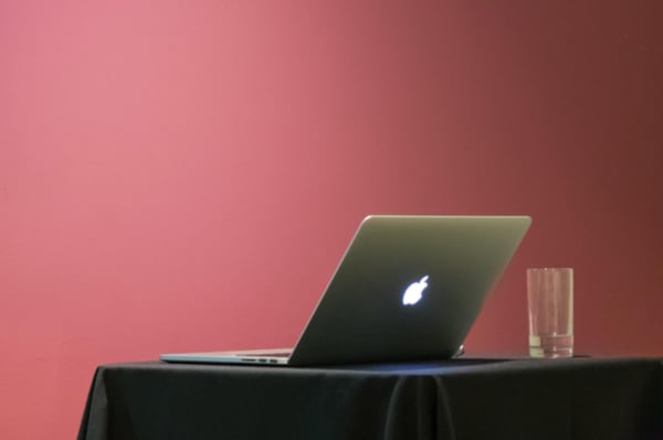 A laptop sat open on a table